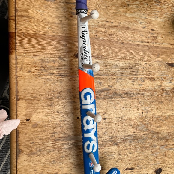 Super fun, athletic wear hooks with a field hockey stick - Picture 2 of 7